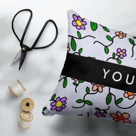 Kleurrijke bloemen, blauwe achtergrond, zwart accent kussen