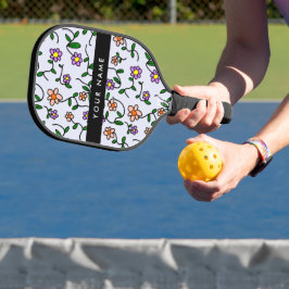 Kleurrijke bloemen, blauwe achtergrond, zwart pickleball paddle
