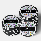 Kleurrijke bloemen, blauwe achtergrond, zwart poker chips (Opstapeling)