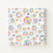 kleurrijke bloemen cirkelpatroon op wit notitieboek (Achterkant)