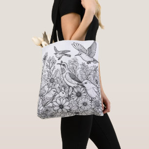 Kleurrijke bloemen en vogels op een kleurplaat tote bag