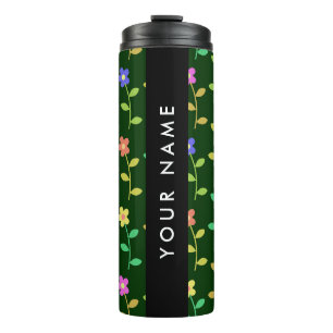 Kleurrijke bloemen, groene achtergrond, zwart thermosbeker