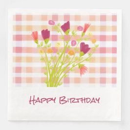 Kleurrijke bloemen met roze servet