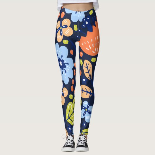 Kleurrijke bloemen op donkere marineblauwe achterg leggings (Voorkant)