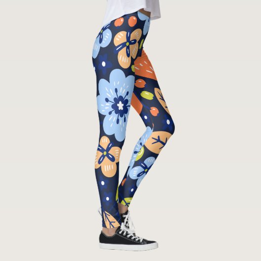 Kleurrijke bloemen op donkere marineblauwe achterg leggings (Rechts)