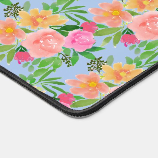 Kleurrijke bloemen op lichtblauw bureaumat (Hoek)