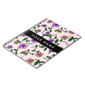 Kleurrijke bloemen, roze achtergrond, zwart notitieboek (Linkerzijde)