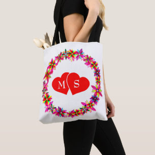 Kleurrijke bloemenkrans en harten tote bag