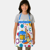 Kleurrijke cirkels en een rommelige verf kunnen en schort (Insitu)