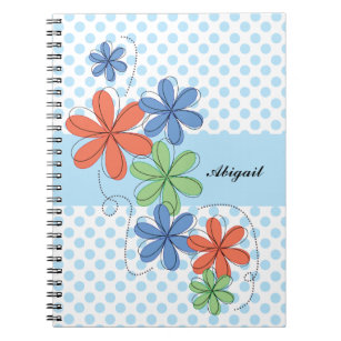 Kleurrijke daisies, blauwe polka stippen, geperson notitieboek