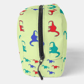 Kleurrijke dinosaurussen patroon op groen toilettasje (Rechts)