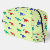 Kleurrijke dinosaurussen patroon op groen toilettasje (Rechterhoek)