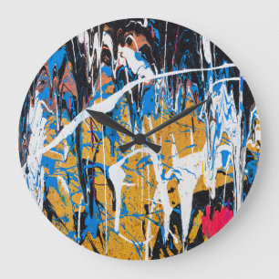 Kleurrijke druppelende verf: graffitimuur. grote klok