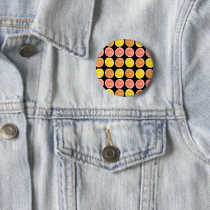 Kleurrijke en helderrode grapefruit plakjes ronde button 5,7 cm