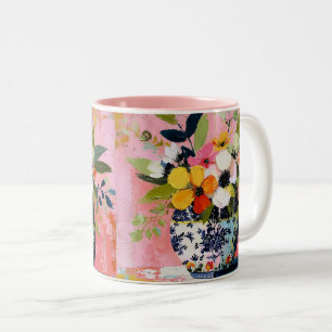 Kleurrijke en levendige vaas met bloemen tweekleurige koffiemok