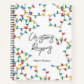 Kleurrijke feestelijke kerstlampjes met kerstrecep notitieboek (Voorkant)