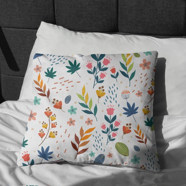 Kleurrijke Floral Print Kussen (Colorful Floral Print Pillow on bed)
