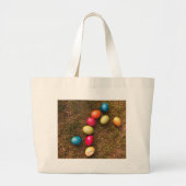 Kleurrijke gekleurde eieren in de tuin, paaseieren grote tote bag (Voorkant)