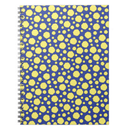 Kleurrijke geometrische gele cirkels op blauw notitieboek