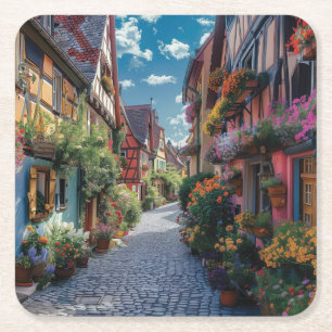 Kleurrijke geplaveide straat versierd met bloemen kartonnen onderzetters