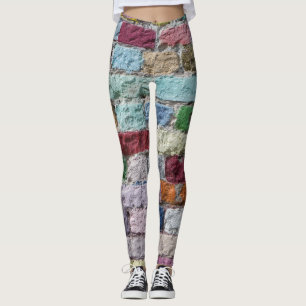 Kleurrijke geschilderde bakstenen wandtextuur leggings