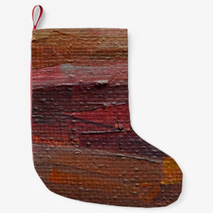 Kleurrijke getextureerde achtergrond van olieverf. kleine kerstsok