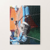 Kleurrijke Griekse Geviste boot gedoceerd in haven Legpuzzel (Verticaal)