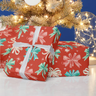 Kleurrijke groene, witte strikken en sneeuwvlokken cadeaupapier