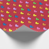 Kleurrijke harten op rood pakpapier (Hoek)