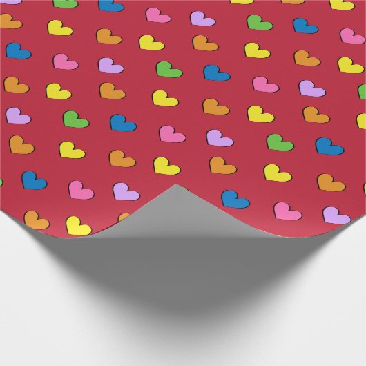 Kleurrijke harten op rood pakpapier (Hoek)