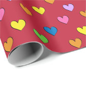 Kleurrijke harten op rood pakpapier (Rol Hoek)