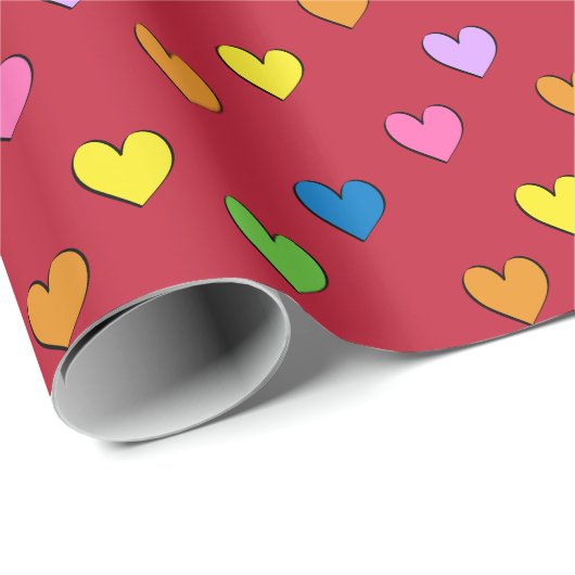 Kleurrijke harten op rood pakpapier (Rol Hoek)