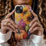 Kleurrijke Herfst Bloemen en Pompoenen iPhone 15 Case<br><div class="desc">Een levendig, modern abstract schilderij met een speelse opstelling van pompoenen, zonnebloemen en ander gebladerte van herfst. Rijke herfsttinten zoals verbrand sinaasappel, dieprood, roze en goudgeel vermengen zich met zachte penseelstreken en gedurfde kleurspatten. De abstracte stijl voegt een eigentijdse flair toe aan het traditionele herfst oogstthema en legt de warmte...</div>