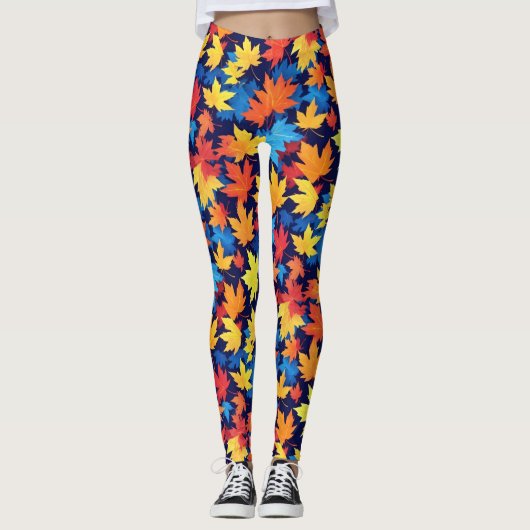 Kleurrijke herfstbladeren op donkerblauwe achtergr leggings (Voorkant)