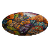 Kleurrijke huizen en bomen in de herfst snijplank (Hoek)