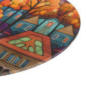 Kleurrijke huizen en bomen in de herfst snijplank (Hoek)