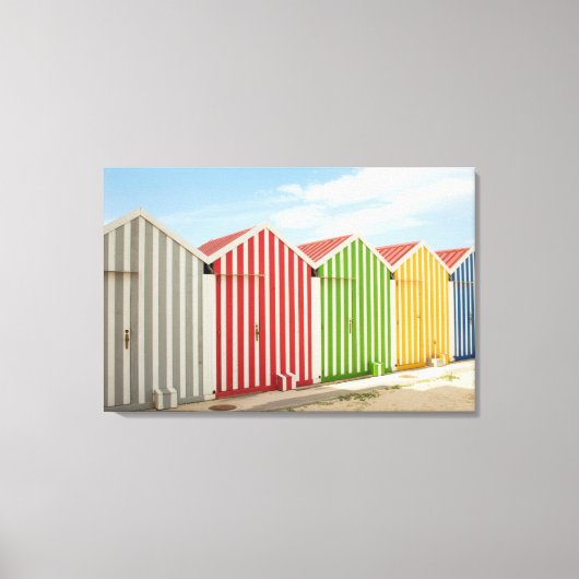 Kleurrijke hutten op strand canvas afdruk (Voorkant)
