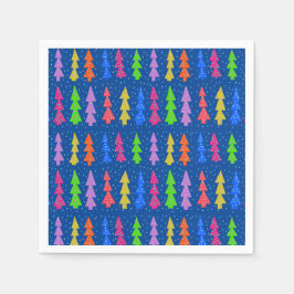 Kleurrijke kerstbomen op blauw servet