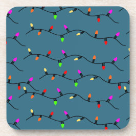 Kleurrijke kerstverlichting op blauw bier onderzetter