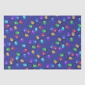 Kleurrijke kerstverlichting op blauw tissuepapier (Voorkant)