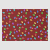 Kleurrijke kerstverlichting op rood tissuepapier (Voorkant)