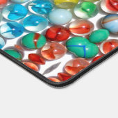 Kleurrijke knikkers artistiek fotoontwerp bureaumat (Hoek)