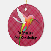 Kleurrijke kolibrie met levendige roze geruite keramisch ornament (Links)