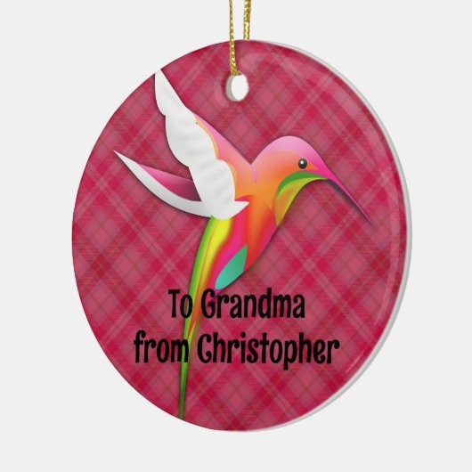 Kleurrijke kolibrie met levendige roze geruite keramisch ornament (Links)