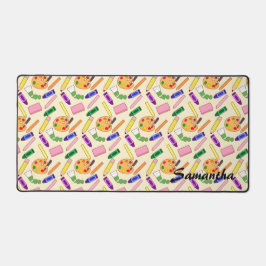 Kleurrijke kunstbenodigdheden bureaumat