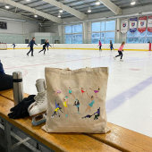 Kleurrijke Kunstschaatsers op het Ijs in Beweging Tote Bag