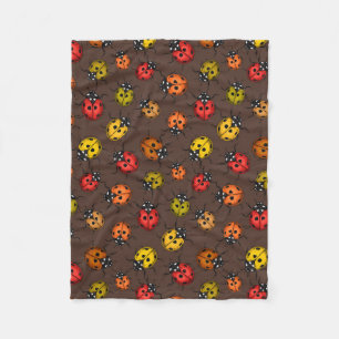 Kleurrijke ladybugs op bruin fleece deken