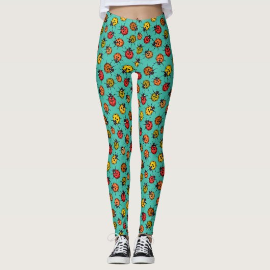 Kleurrijke ladybugs op turkooizen leggings (Voorkant)