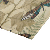 Kleurrijke libellen die boven bladeren drijven snijplank (Hoek)