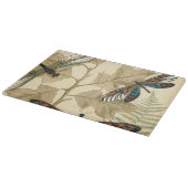 Kleurrijke libellen die boven bladeren drijven snijplank (Hoek)